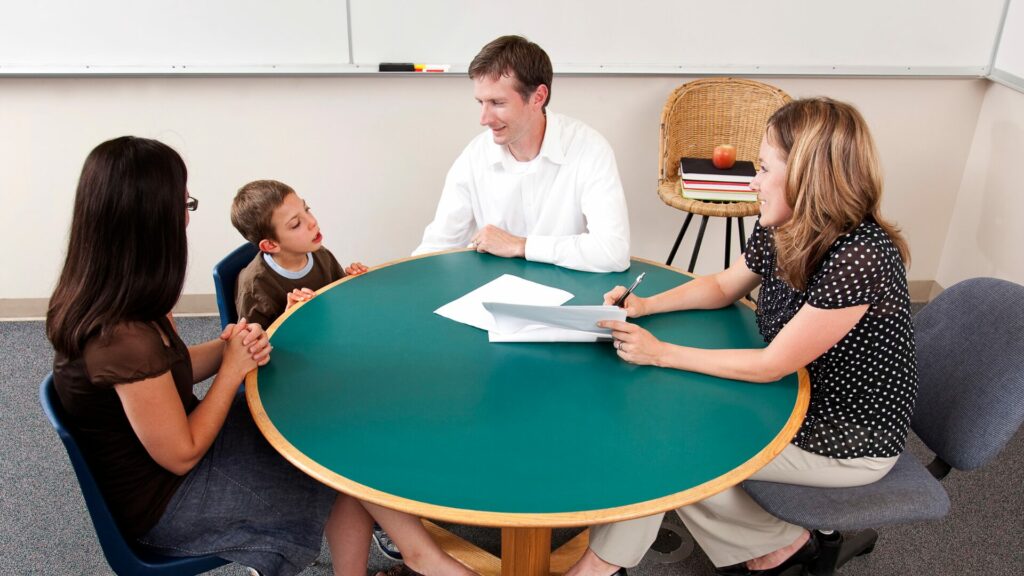 Play therapy session with child and counselor